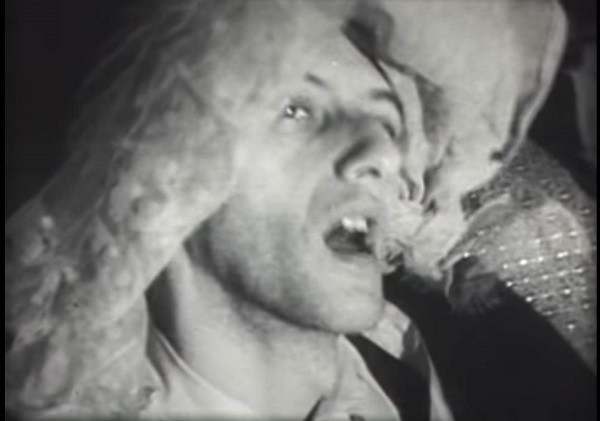 A screen shot from the 1965 movie, Blonde Cobra, by artist, Ken Jacobs, that also functions as a link to the film