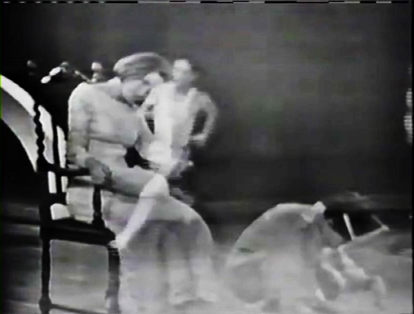 A screen shot from the 1967 movie, Linoleum, by artist, Robert Rauschenberg, that also functions as a link to the film