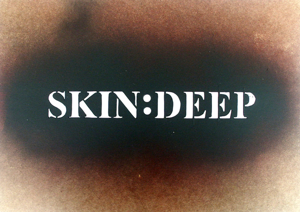 A graffiti stencil that reads SKIN DEEP by Stephen Kaltenbach