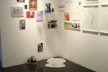 A wall and works on the floor from GIFT SHOW at ANOTHER YEAR IN LA