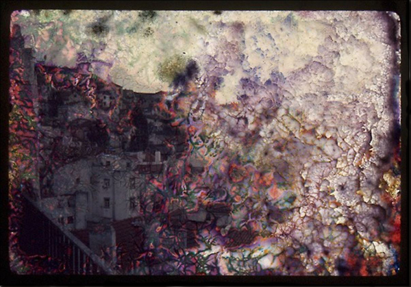 Digitized multicolor 35mm slide that appears to be an abstract image altered by mold
